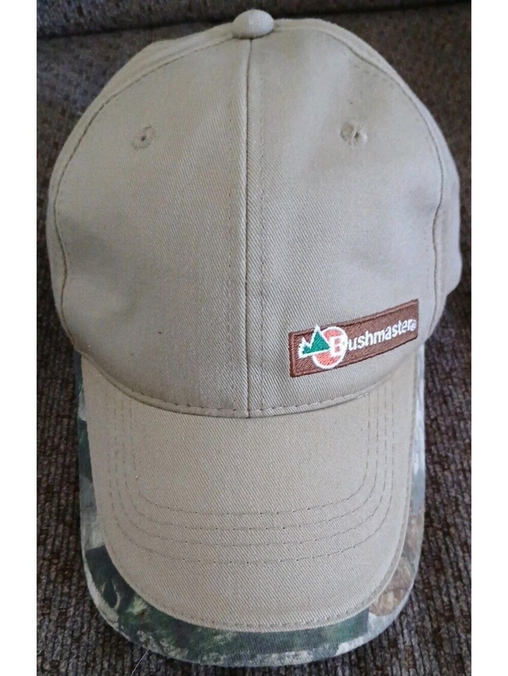 Bushmaster Hat Cap Strap Back Adjustable Tan Camo Hunting